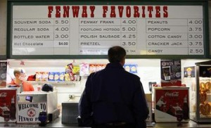 A fan orders at a concession stand at Fenway Park prior to Game 1 of Major League Baseball's World Series between the Boston Red Sox and Colorado Rockies in Boston