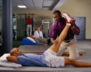 Physical Therapist Working with Patient